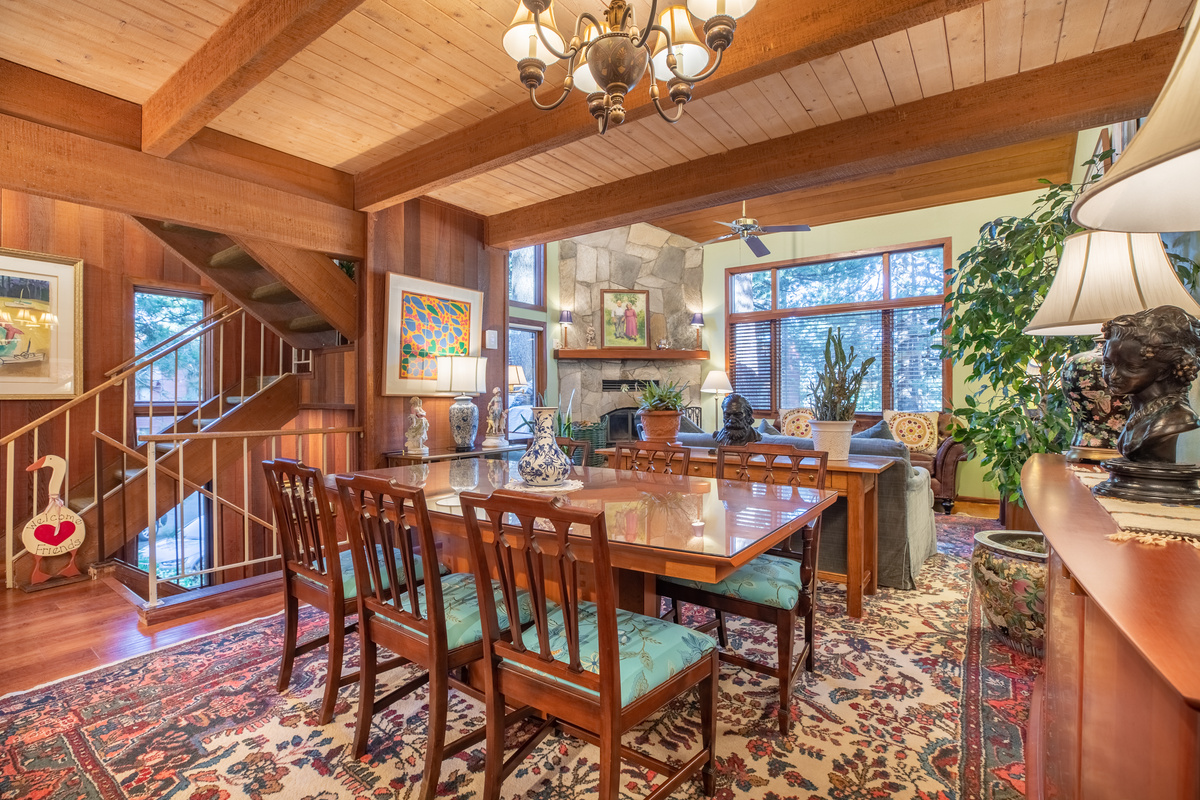 General dining area with seating for six but space with eight, if you bring down the folding chairs from the loft.