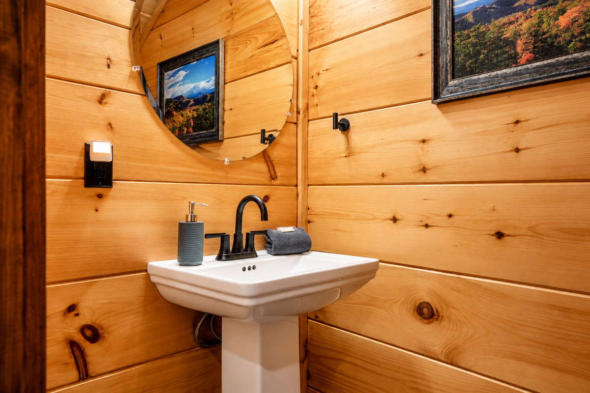 Fall foliage art and glowing pine walls greet you on a quick stop to wash up.