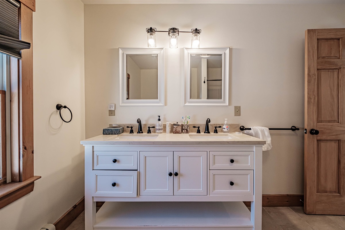 The master ensuite includes a full bath with tub and shower.