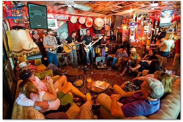 Red Bar has all the fun. Local bands play every night. Don’t let the name fool you. There’s delicious food too!