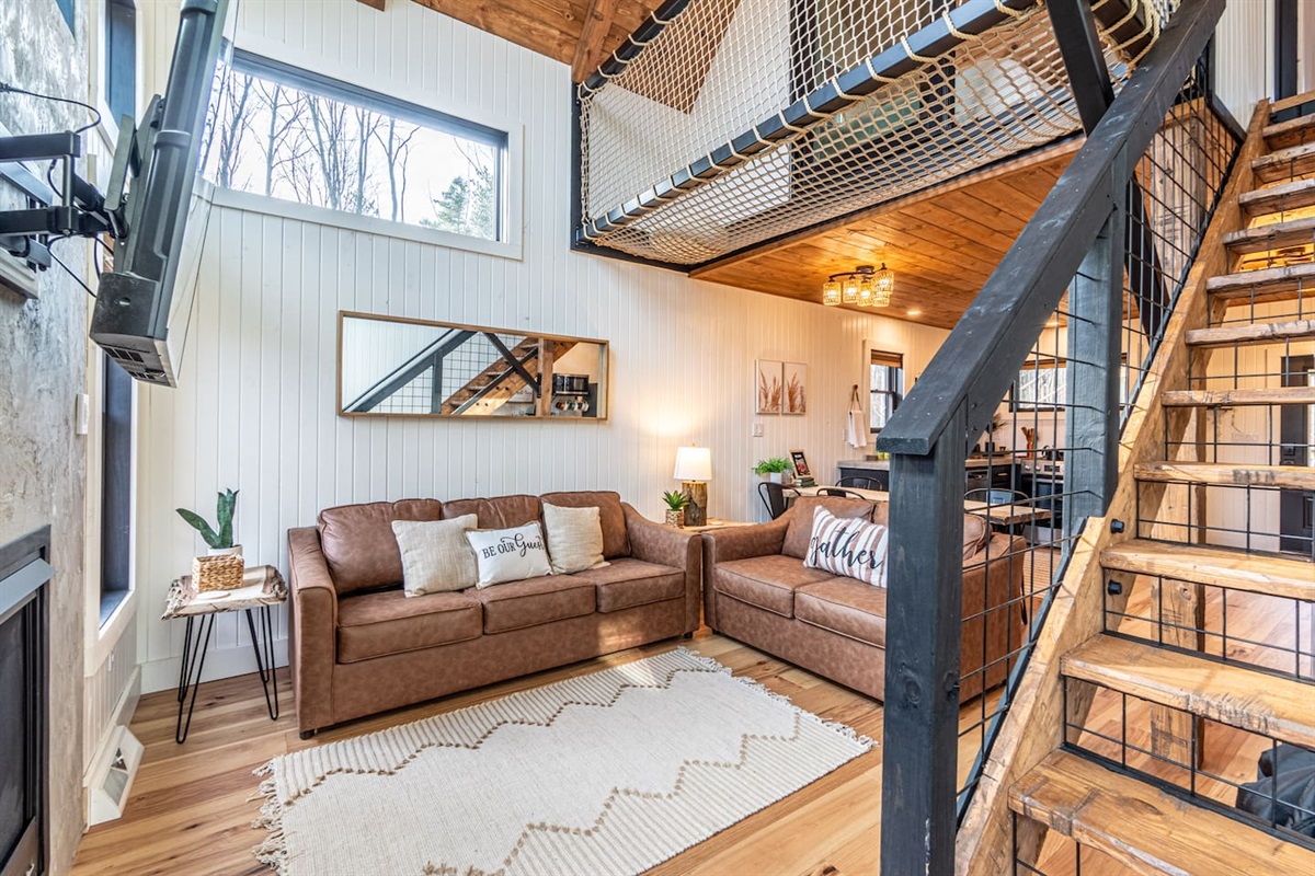 This living room features a queen size pull-out sofa bed.