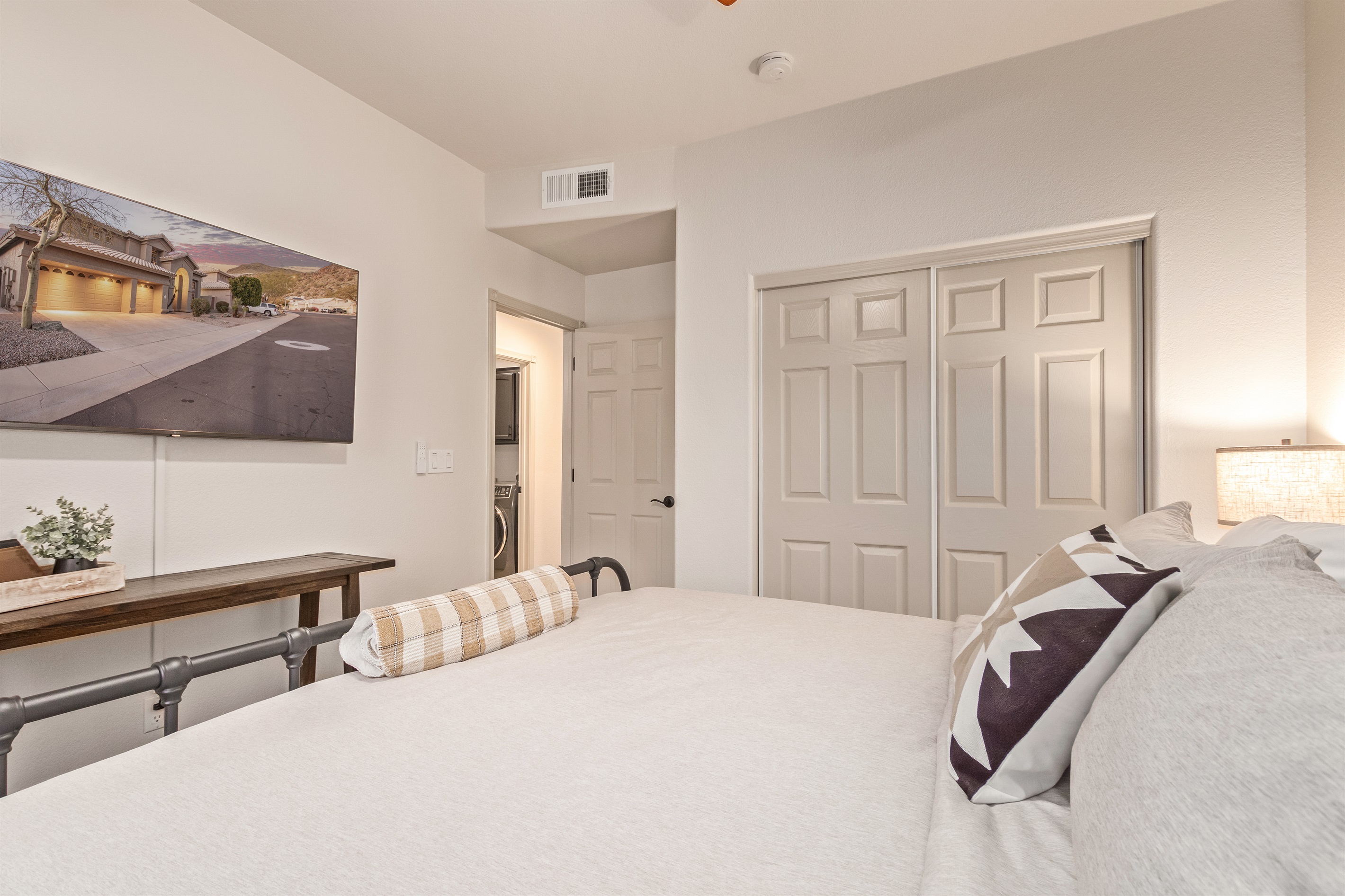 Main floor king bedroom no stairs required, plus a 55" smart TV, linens, extra pillow and blankets, ceiling fan and room darkening shades 