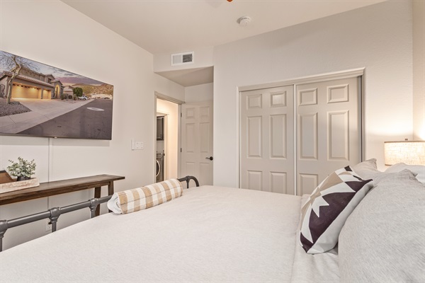 Main floor king bedroom no stairs required, plus a 55" smart TV, linens, extra pillow and blankets, ceiling fan and room darkening shades 