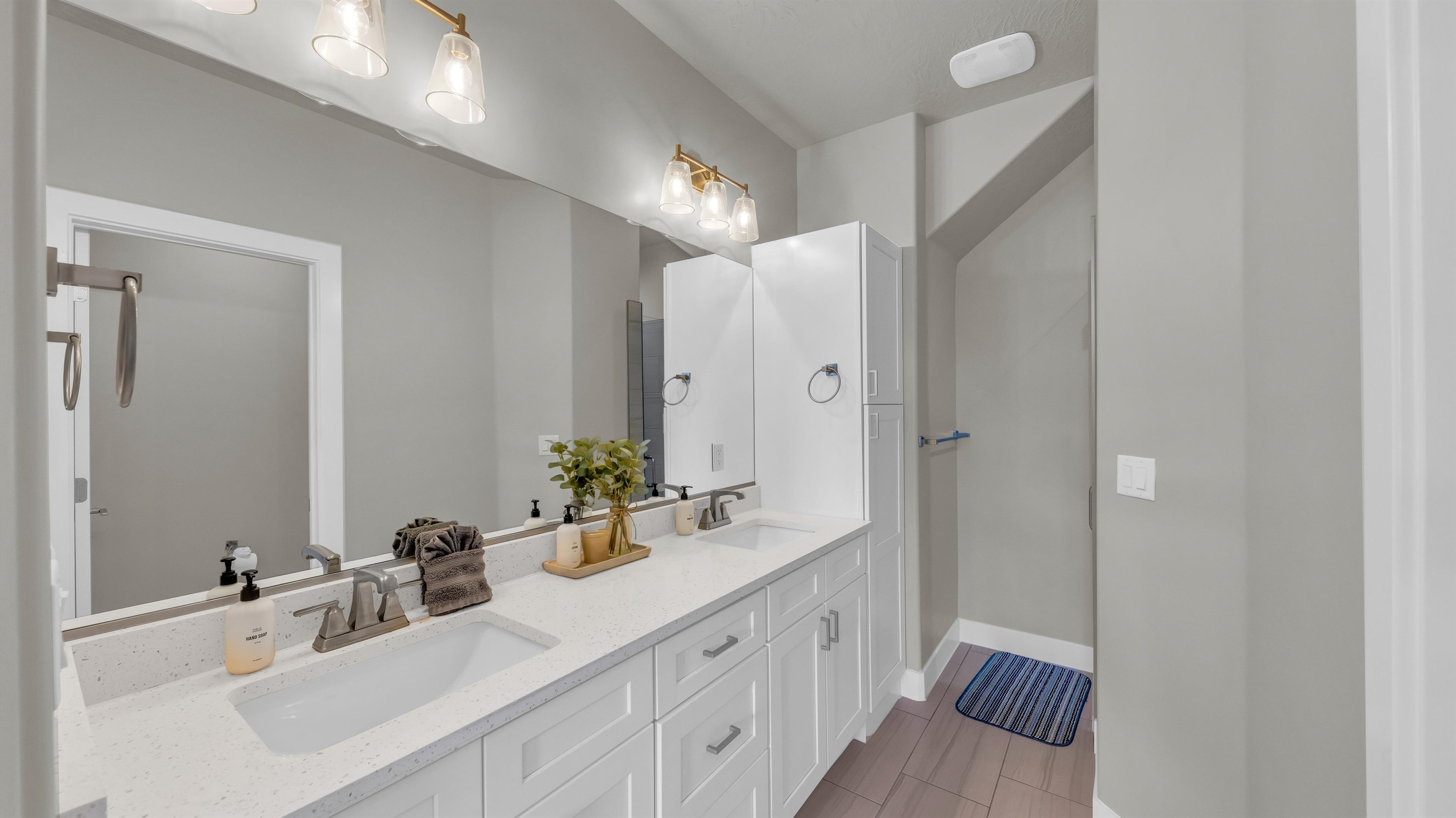 Ensuite with Dual Vanity & Gold Accents