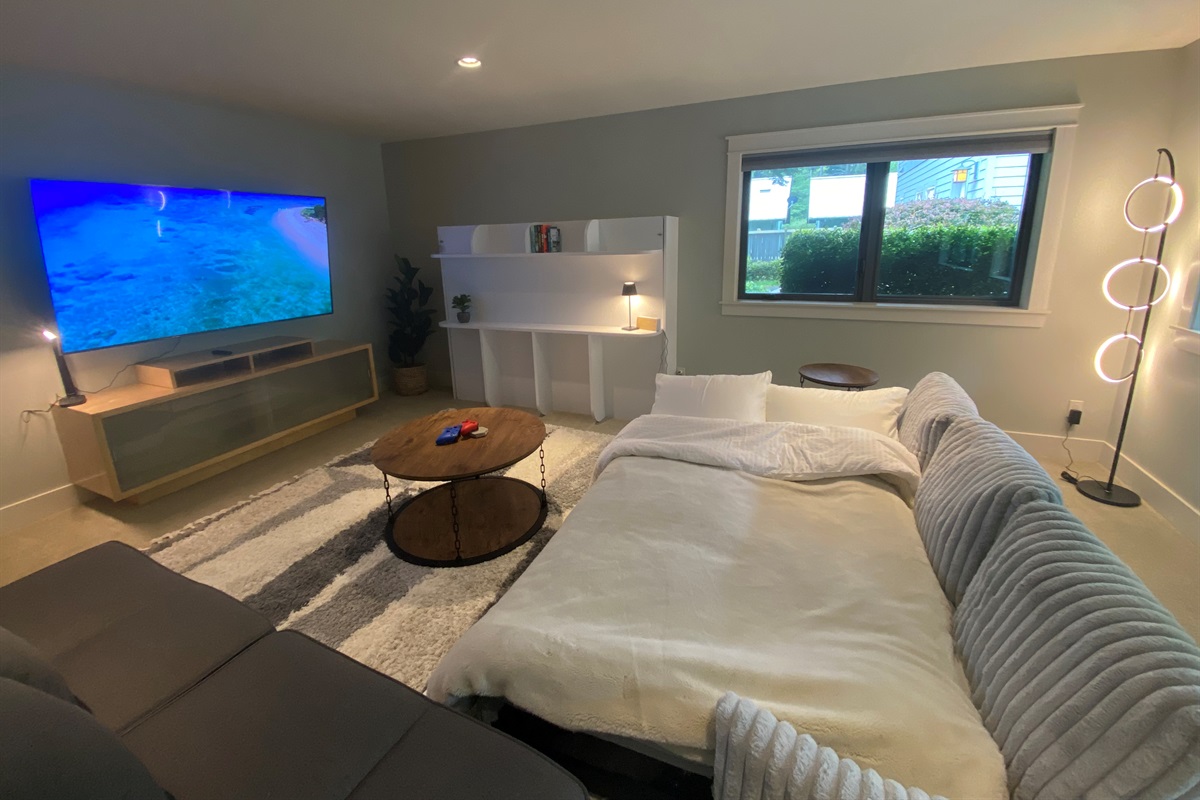 In the third bedroom the cozy couch can be pulled out with ease to create a double bed or the perfect family cuddle area for movies on the big screen TV. 