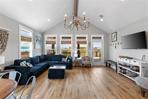 Enter this expansive and breathtaking living area, where elegance and comfort seamlessly merge into one