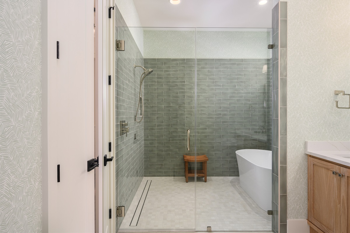 Master features large walkin shower and deep soakig tub