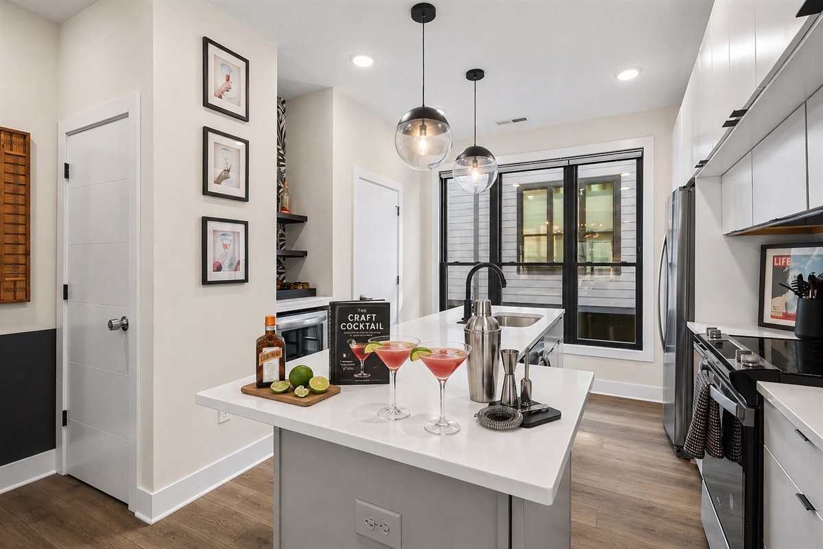 A bright, modern kitchen made for more than cooking&mdash;mix cocktails, share small bites, and gather around the island with ease.