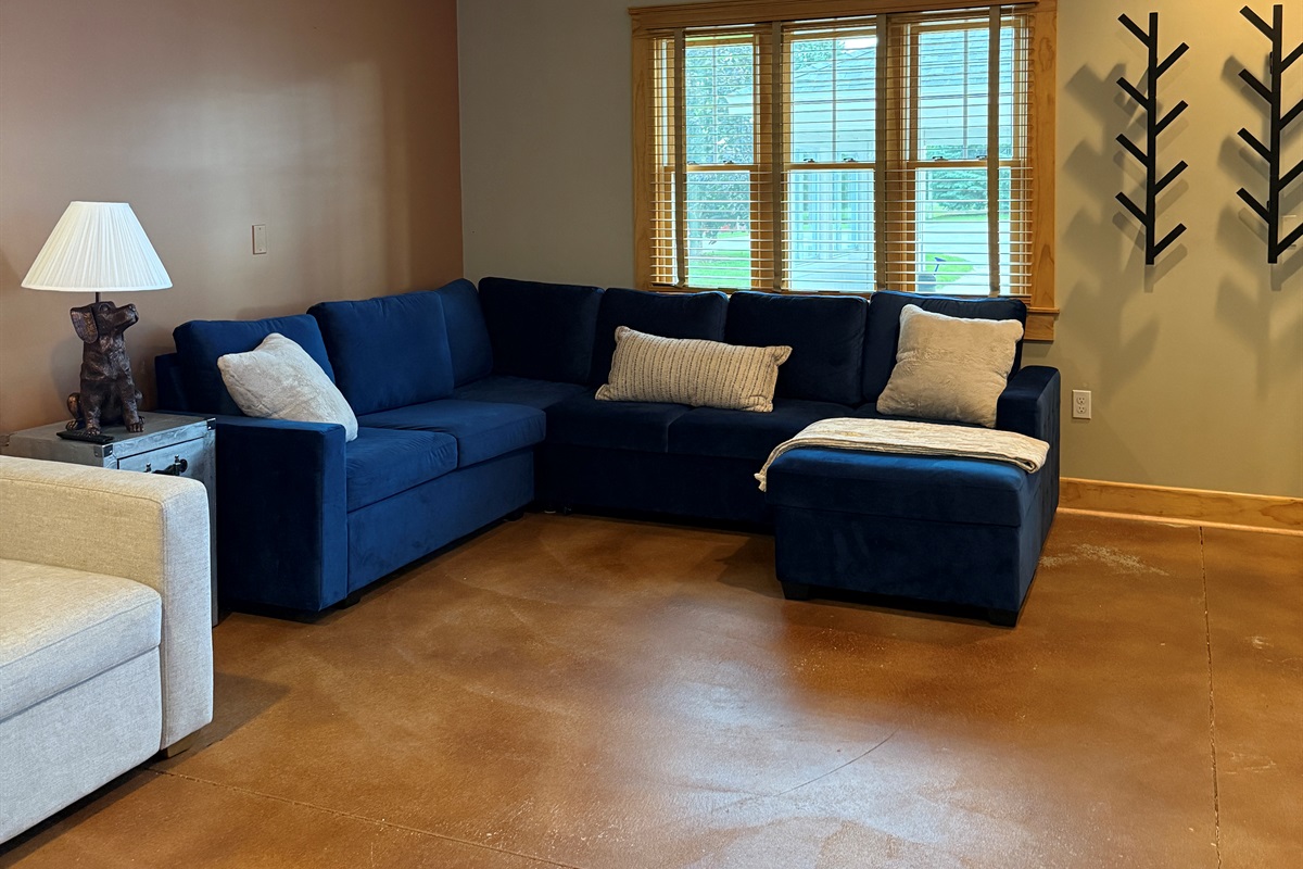 Snuggle up in the velvet sectional sofa to watch a good movie. You may want to open it up into the bed to enjoy a sleepover experience!