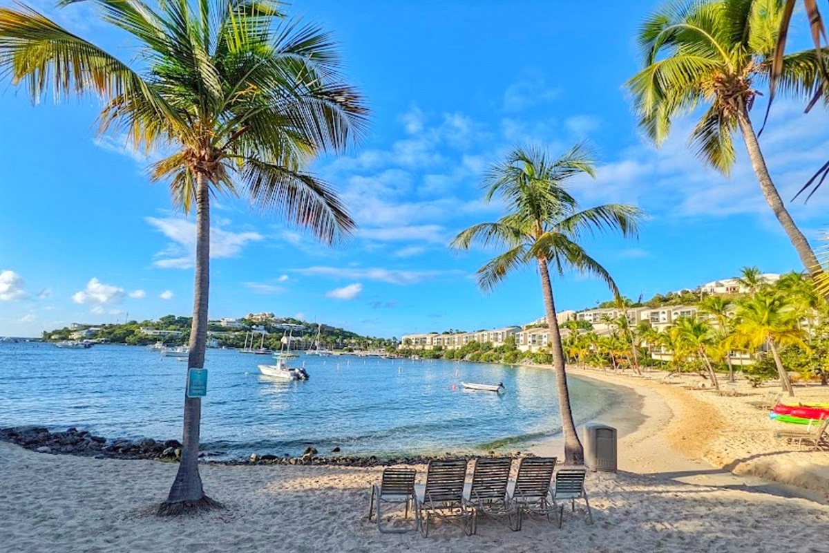 A second poolside angle revealing sparkling waters under sunny skies.