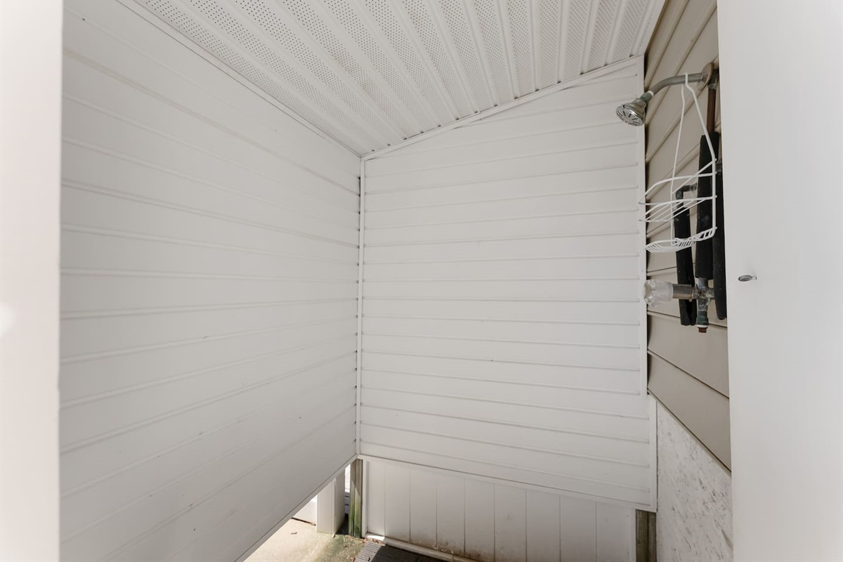 Enclosed outdoor shower. 