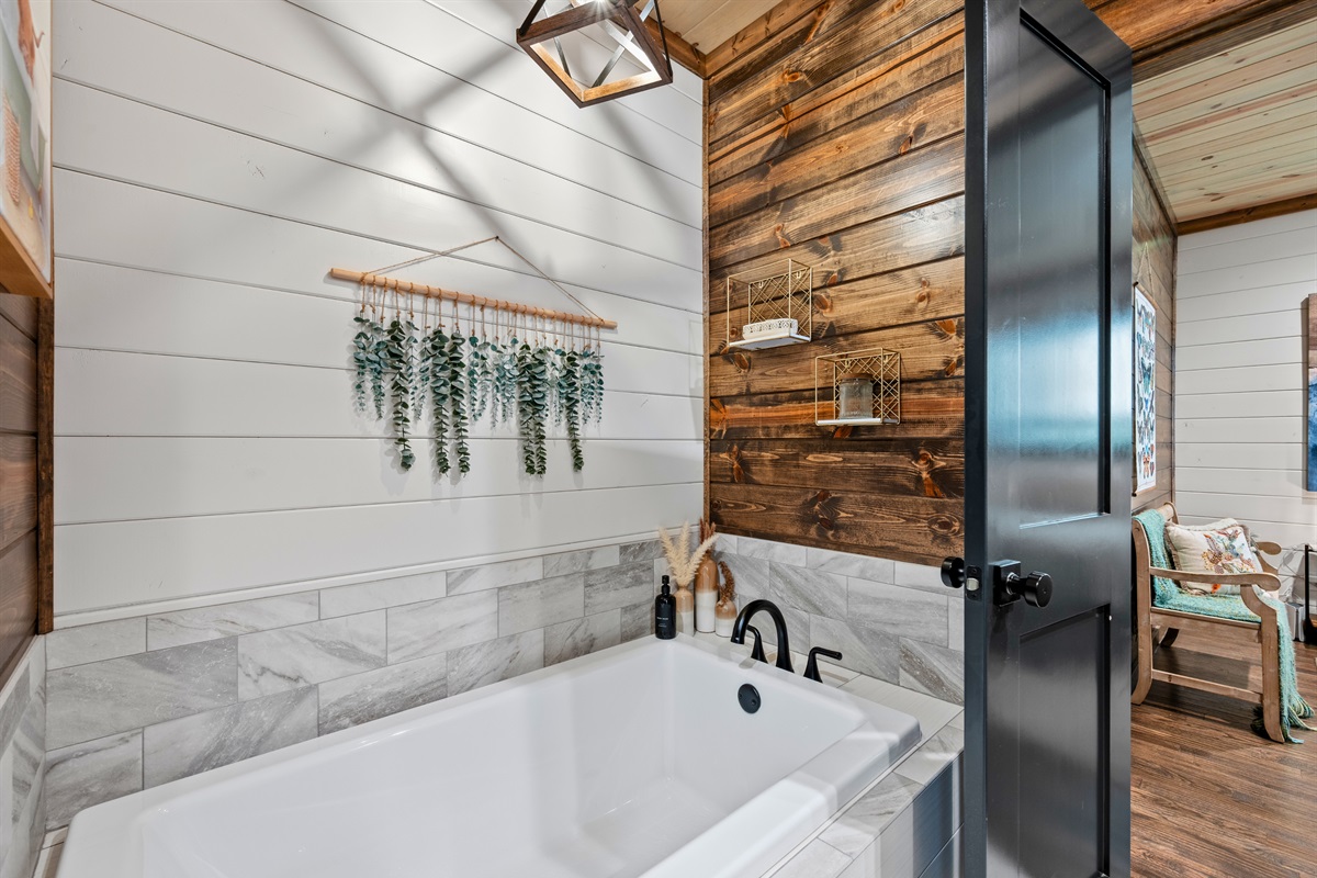 With bright finishes and a relaxing tub, this bathroom feels fresh and comfortable, perfect for slow evenings and easy mornings.