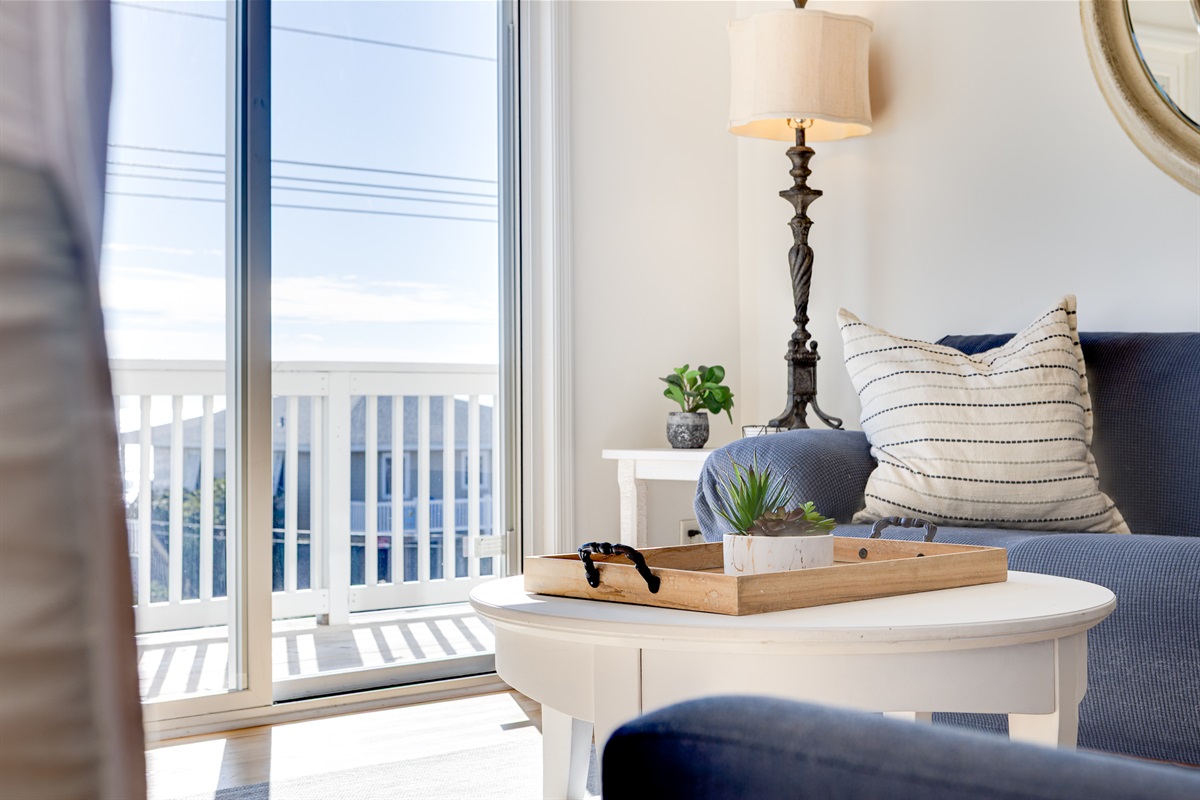 Sunlight pours into this intimate living space, made for slow mornings, quiet evenings, and moments meant to be shared