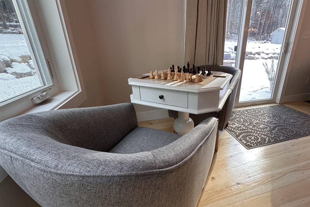 Chess Table in the living room that faces the backyard