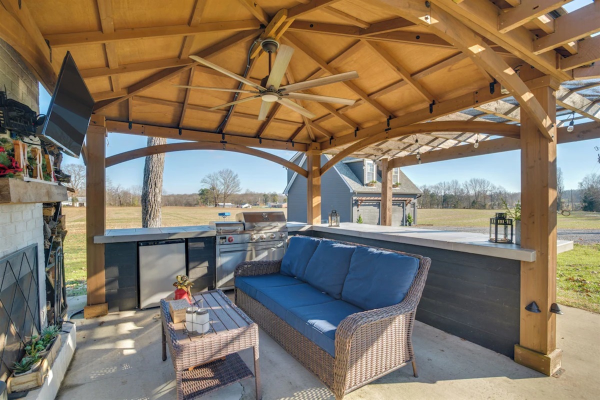 Outdoor covered kitchen with smart TV