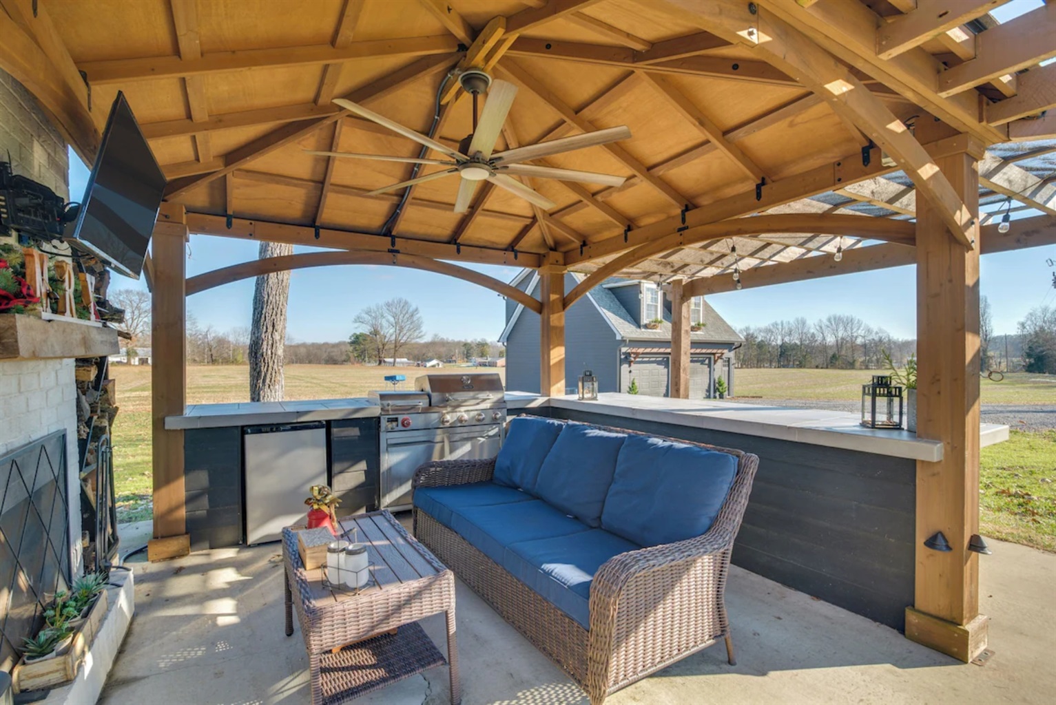 Outdoor covered kitchen with smart TV