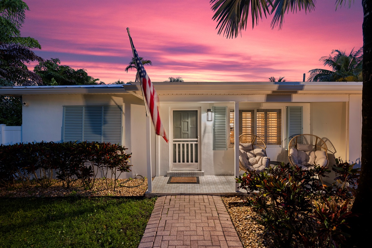 Safe and secure sanctuary. The beautifully lit exterior and fencing create a welcoming, private, and secure evening atmosphere.