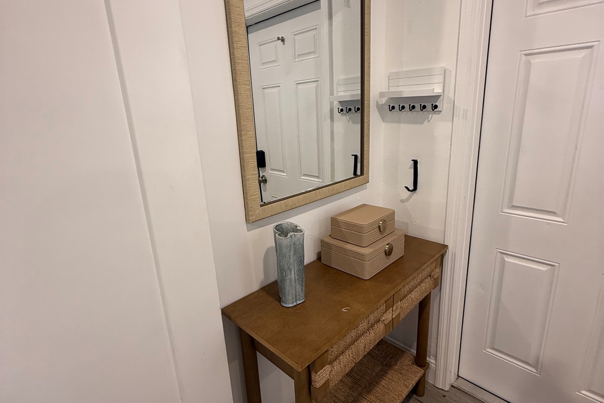 A welcoming entryway to settle in, drop your bags, and feel right at home.