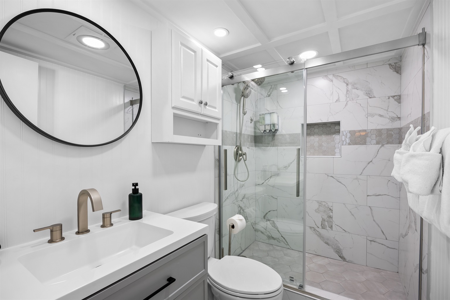 Enjoy the luxury of a newly renovated master bathroom with sleek updates and contemporary style.