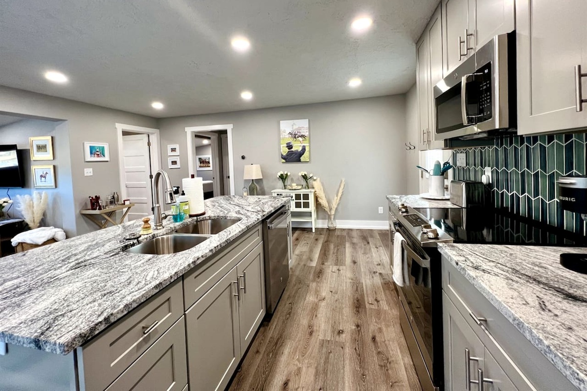 Gourmet Kitchen: Whip up delicious meals with modern appliances and stunning granite countertops!