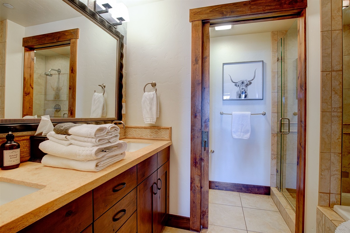Primary bath with double sinks, shower and deep soaking tub
