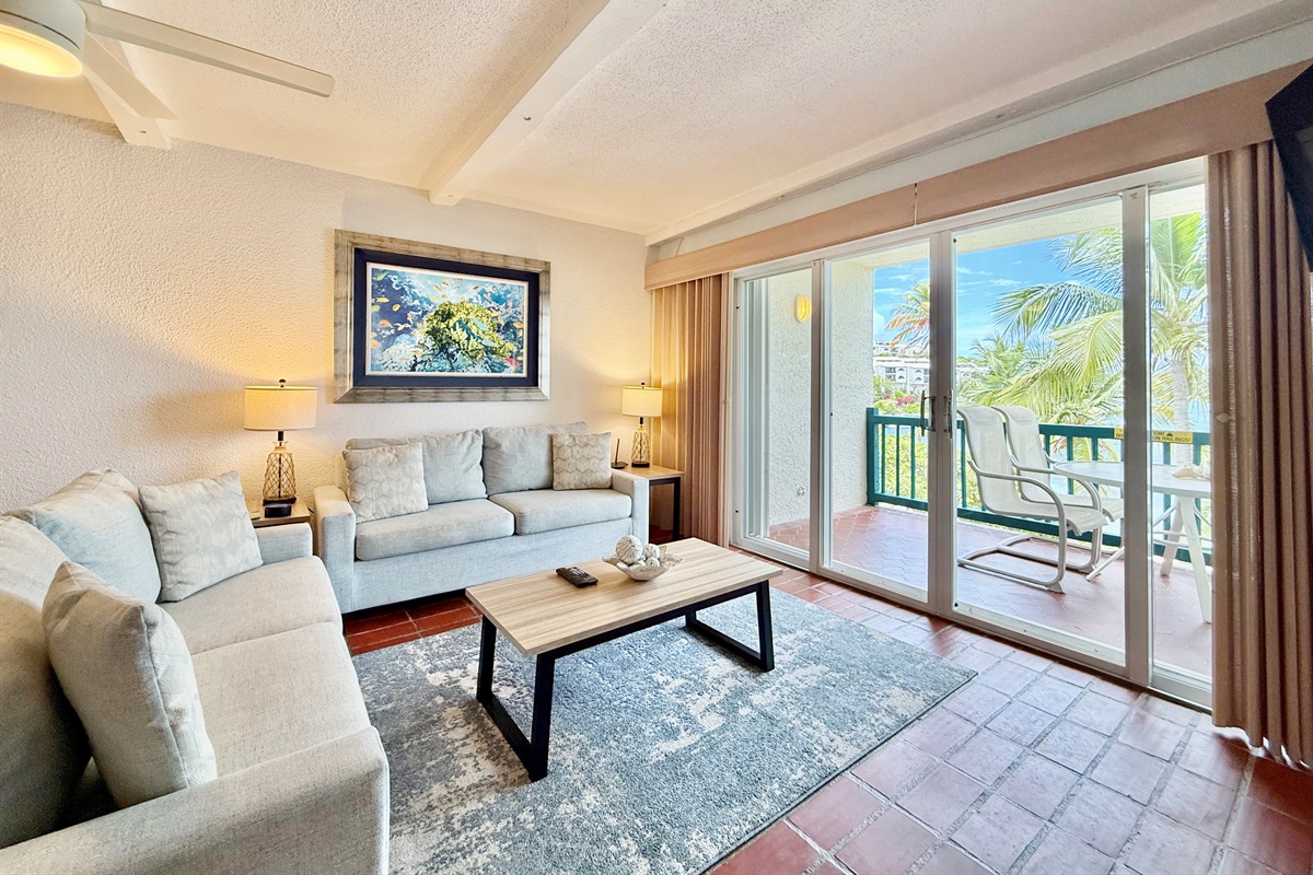 Comfortable living room with plenty of seating to gather with friends and family