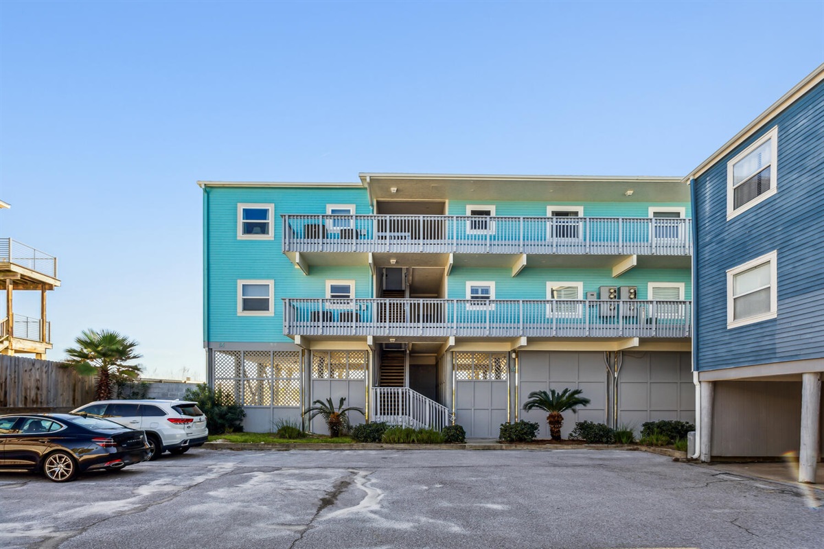 M building.  Built on Pilings and requires the use of stairs.
