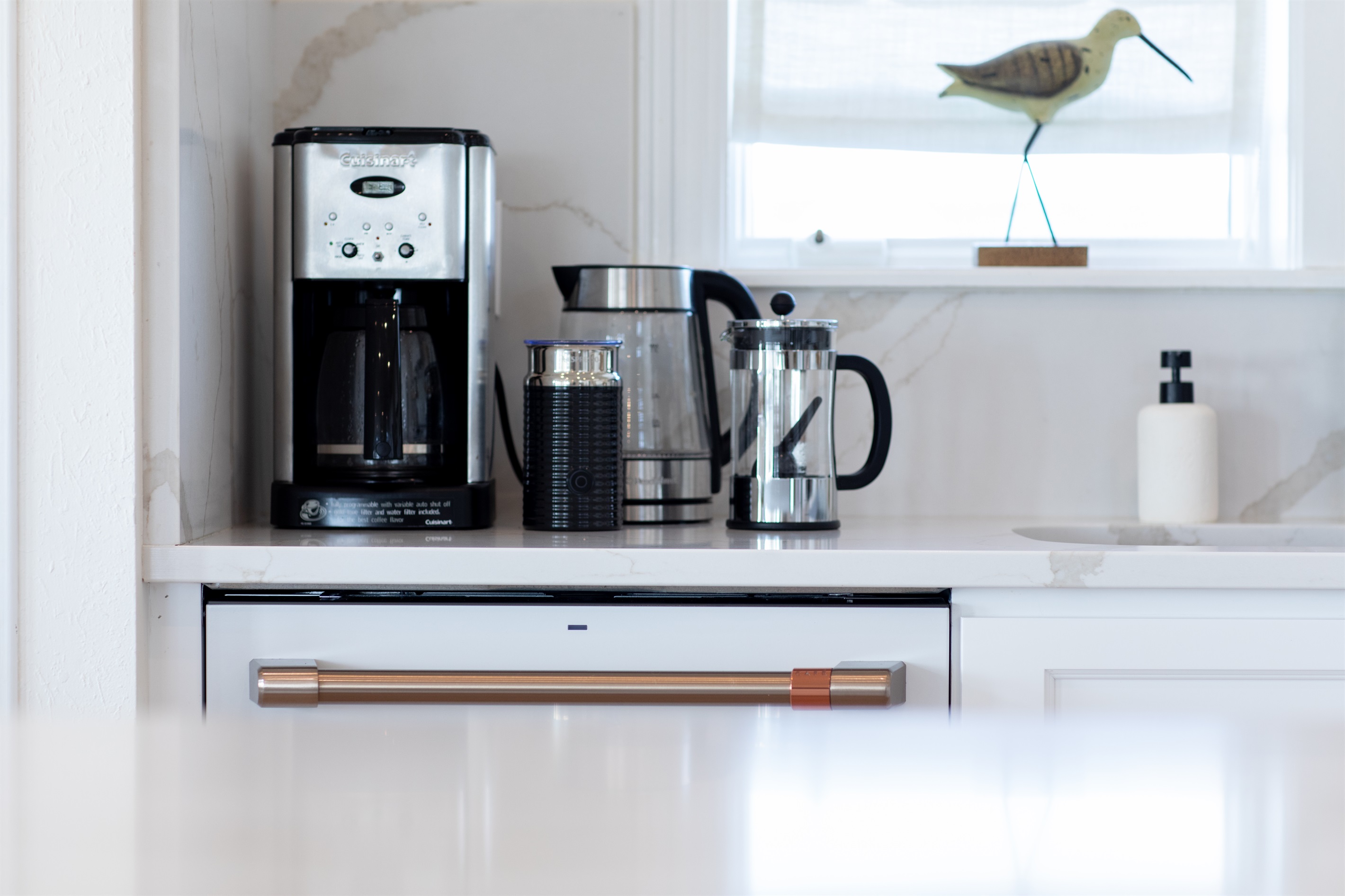 Kitchen with Keurig, coffee maker and tea kettle