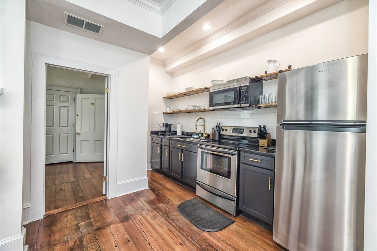 The Kitchen is stocked with cooking essentials. 