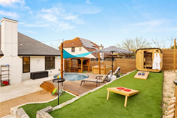 The whole backyard experience: soak, sweat, play, and relax; all in one private, fenced space.