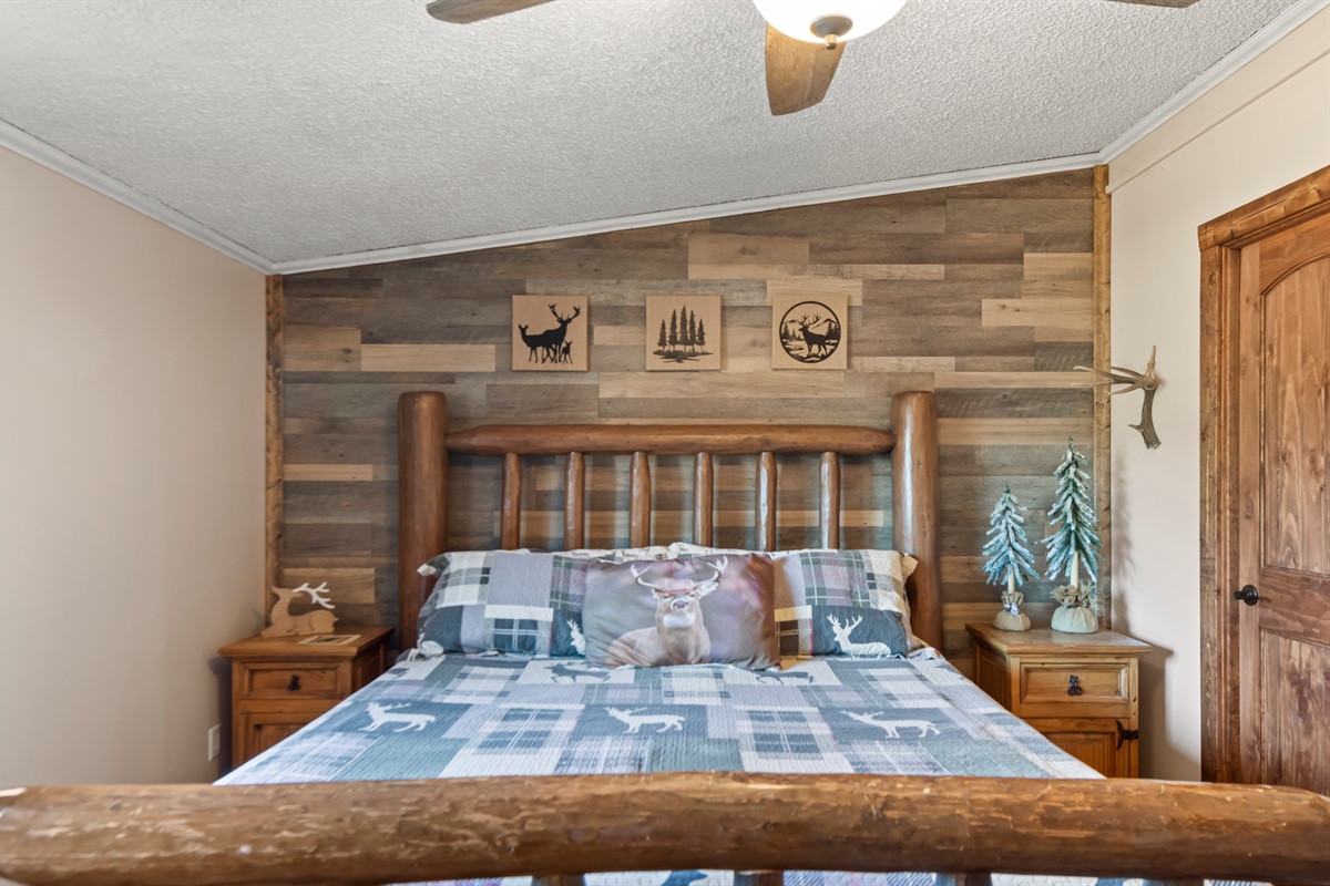 Rustic charm meets modern comfort in this cabin bedroom.