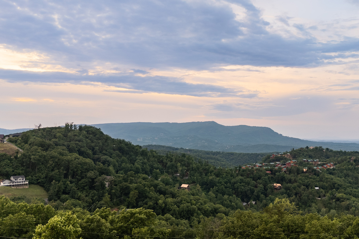 Sky mountain views!  Cresting sunsets with long mountain views amongst the clouds in the horizon give guests staying at Skycrest Retreat a truly special Smoky Mountain experience.  Guests love to relax on our spacious outdoor decks and admire those views!