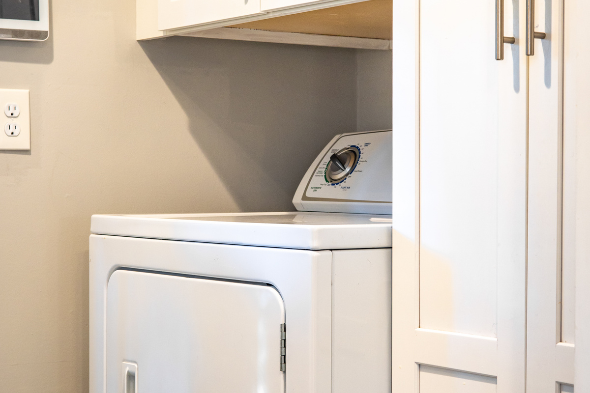 In-unit laundry area, off of the kitchen.