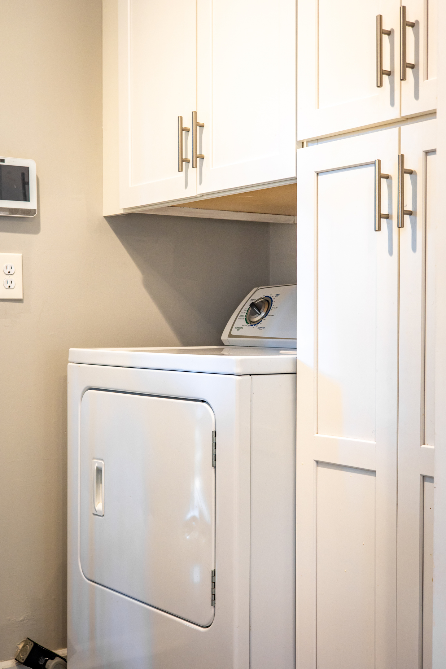 In-unit laundry area, off of the kitchen.