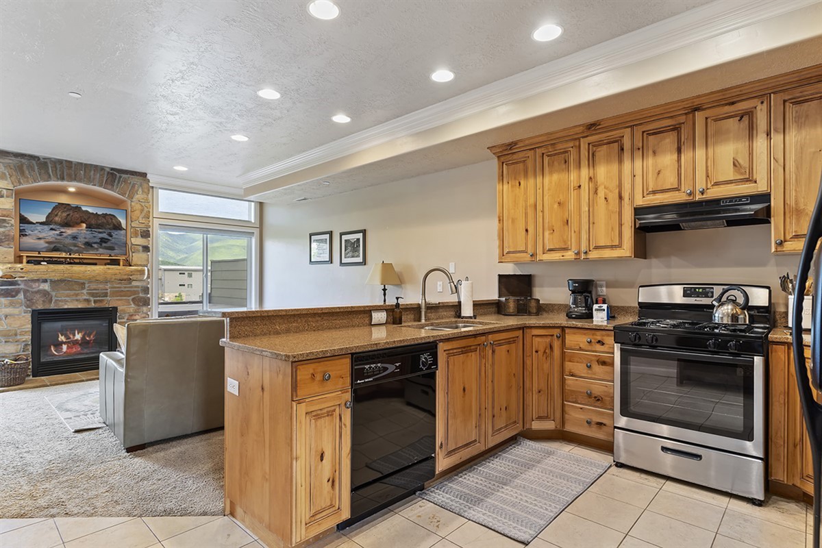 Fully equipped kitchen with stainless steel appliances and everything you need for home-cooked meals.