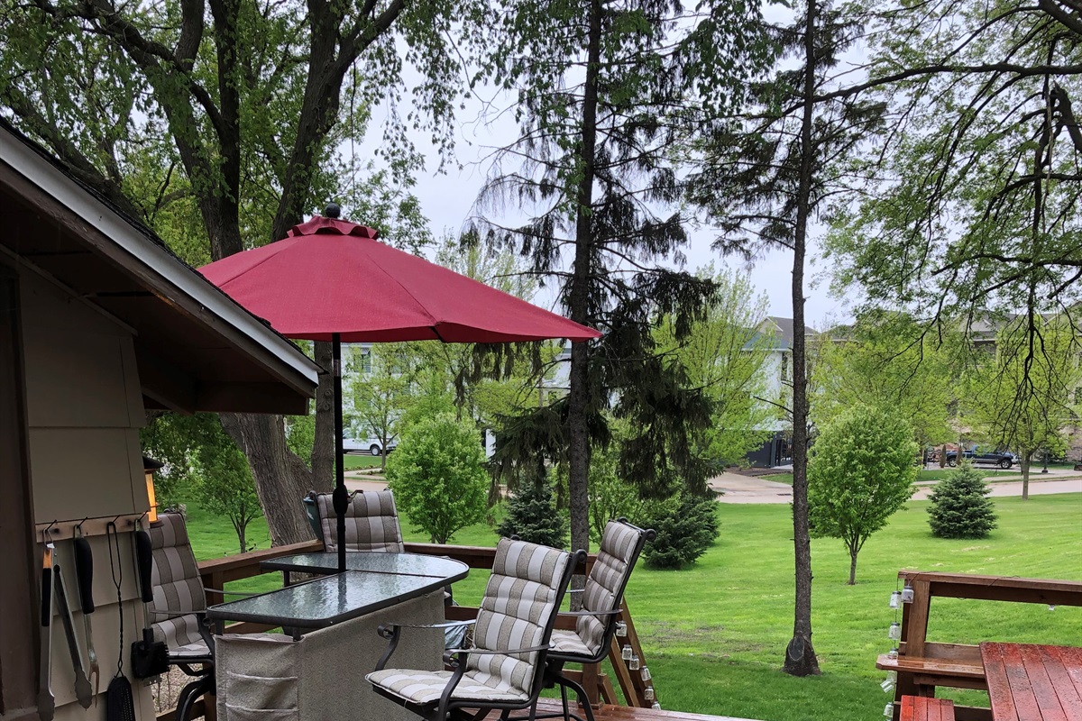 Back yard and deck with gas grill