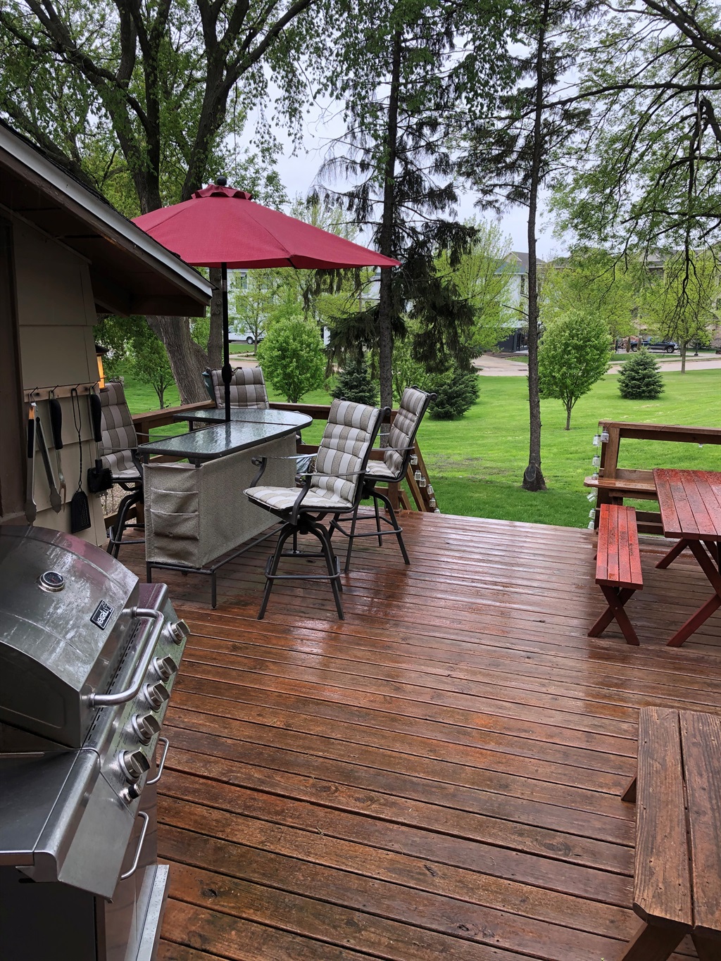 Back yard and deck with gas grill