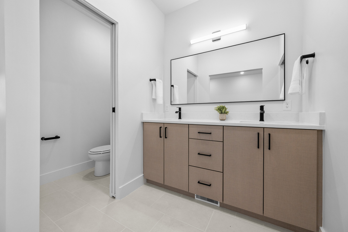 Additional vanity and storage provide convenience for groups.