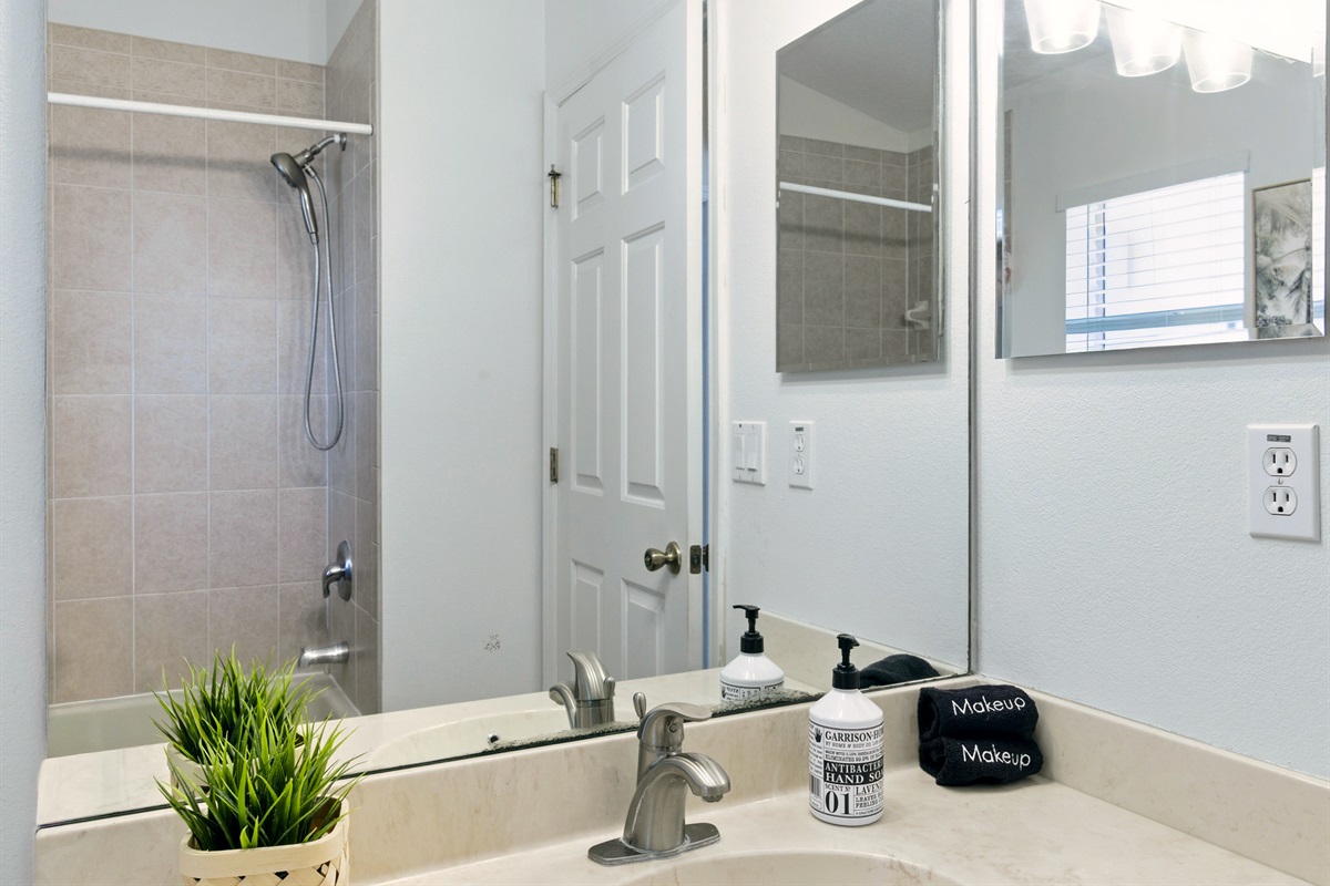 Central bathroom with combo tub/shower