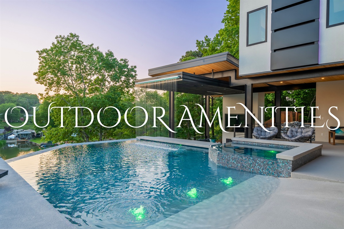 Experience outdoor living at its finest with our beautifully designed pool area, complete with lounging chairs and ambient lighting.