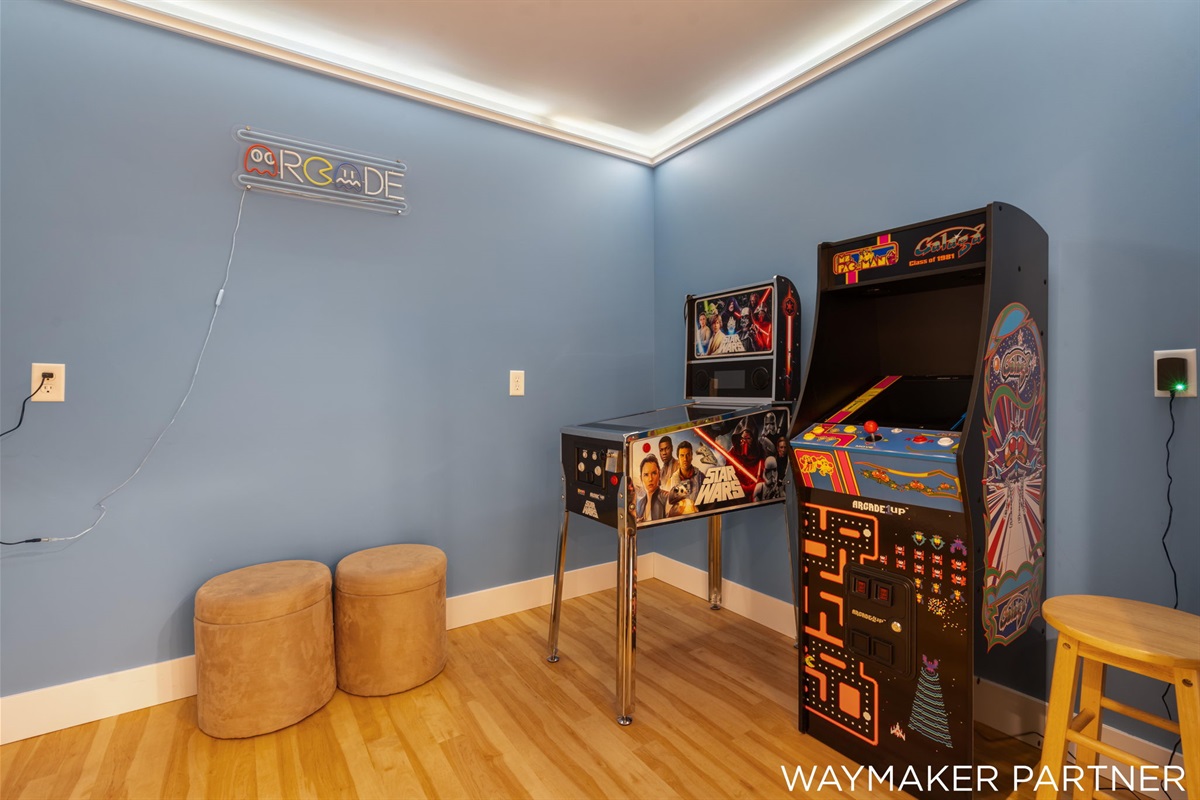 We have a private arcade room with plenty of fun games including Pac Man, Star Wars pin ball machine, etc.