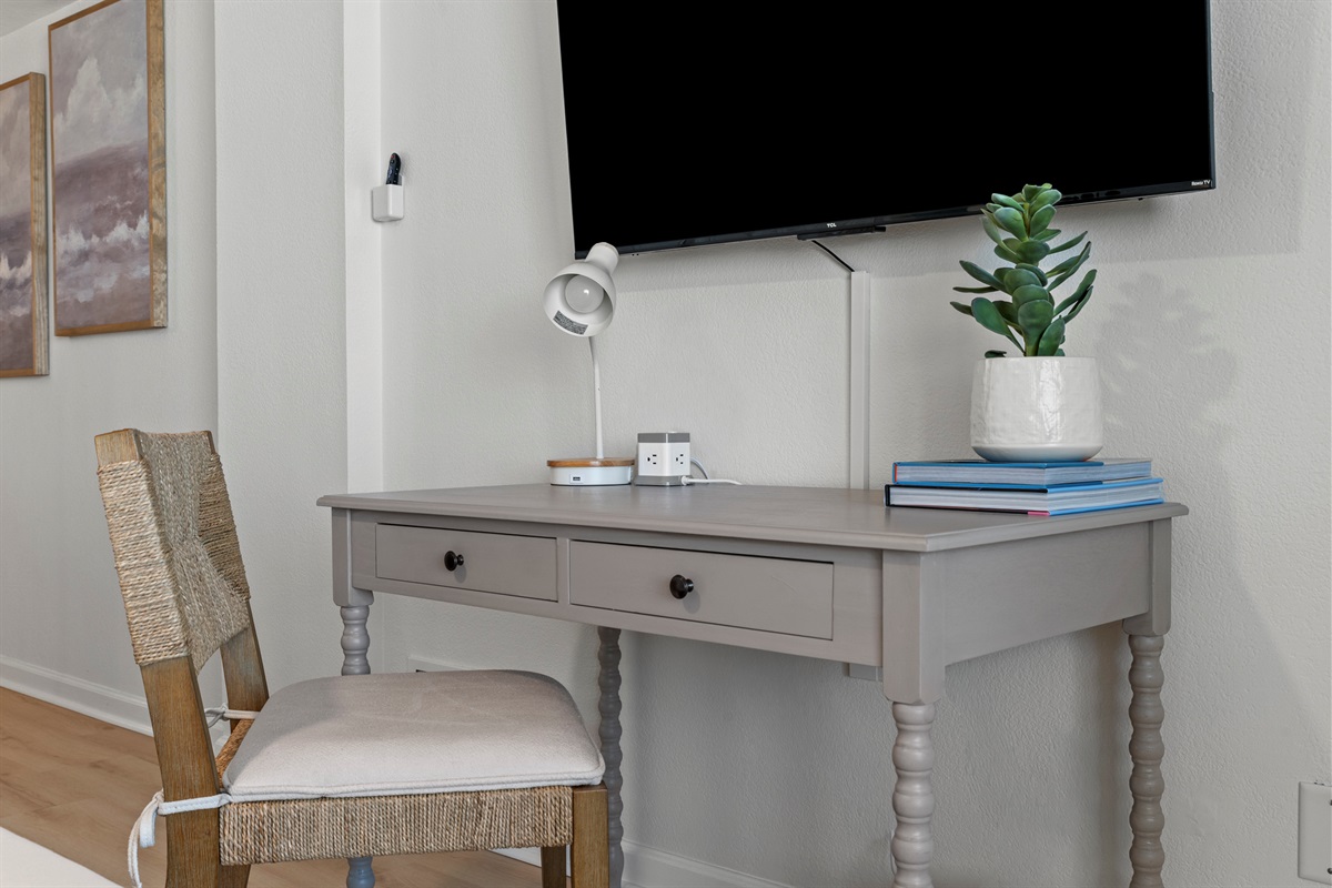 Stay productive in paradise with a dedicated workspace and easy-access charging ports.