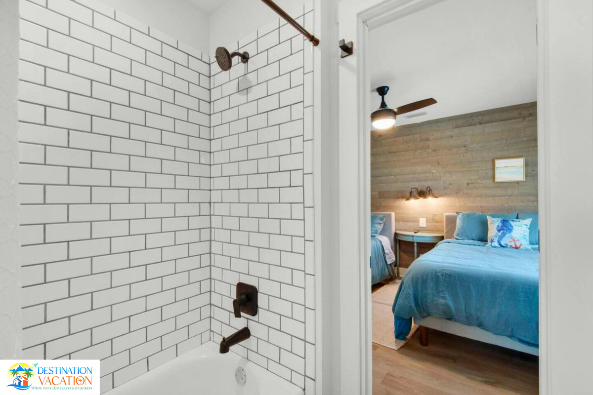 Bright bathroom keeps coastal mornings feeling fresh.