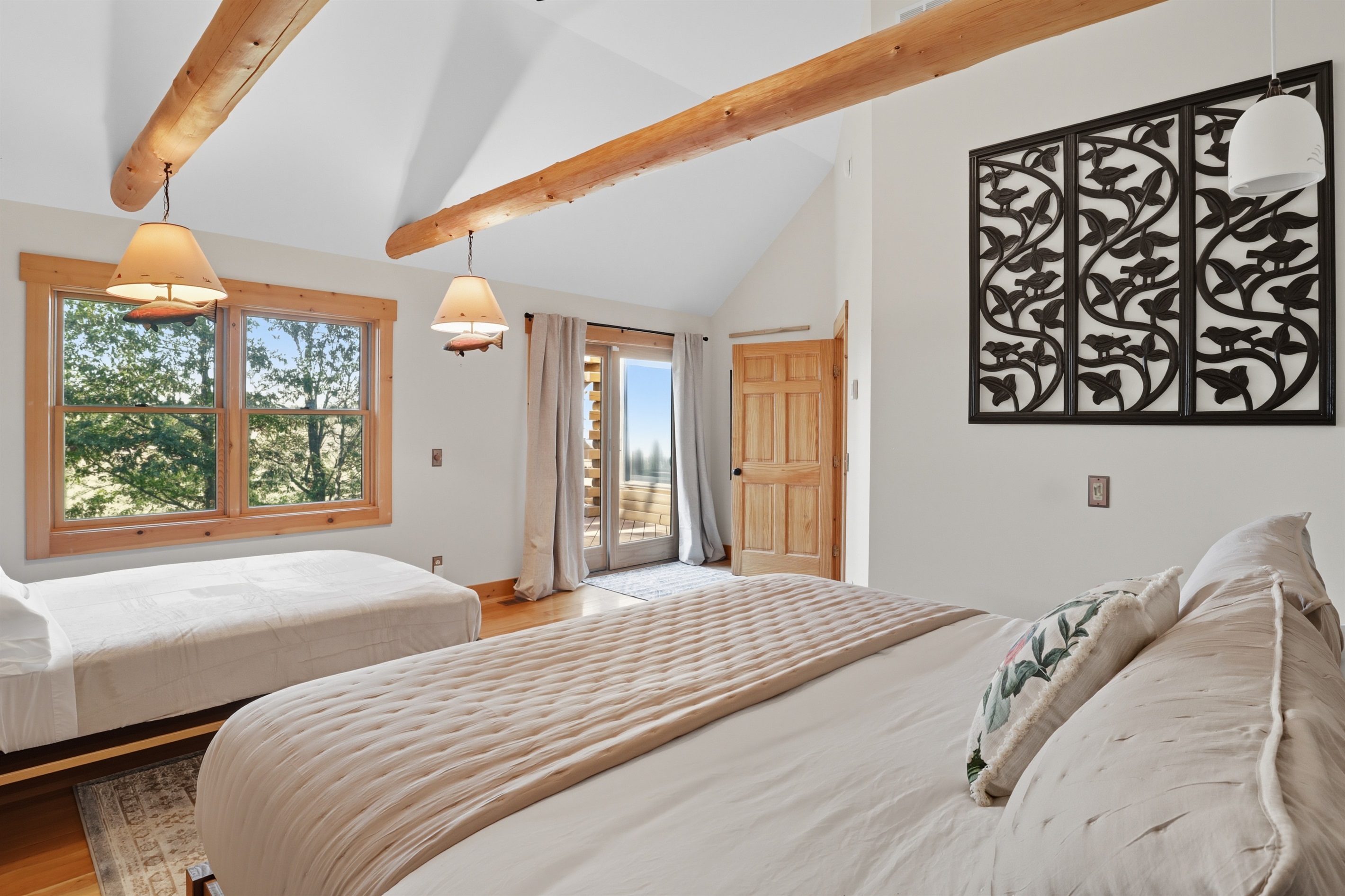 Bedroon 1, Spacious king master bedroom with queen Murphy bed and private outdoor access.