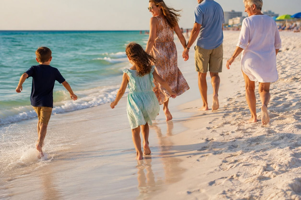 AI-created family beach-day illustration inspired by Panama City Beach. Off-property outing; shoreline conditions vary.