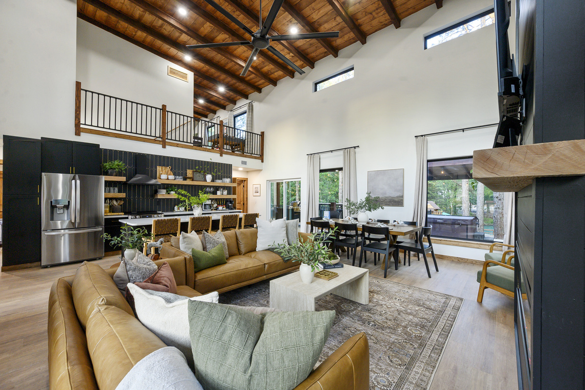 Soaring wood ceilings, warm modern finishes & an open living, dining and kitchen layout create one beautiful gathering space, designed for long meals, easy conversation and time together.