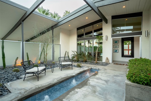 Courtyard with fountain and seating area