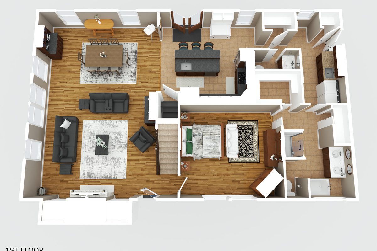 1st-floor layout showing the spacious living and dining areas, kitchen, main-floor bedroom bedroom, bathrooms, and the home&rsquo;s open-concept flow.
