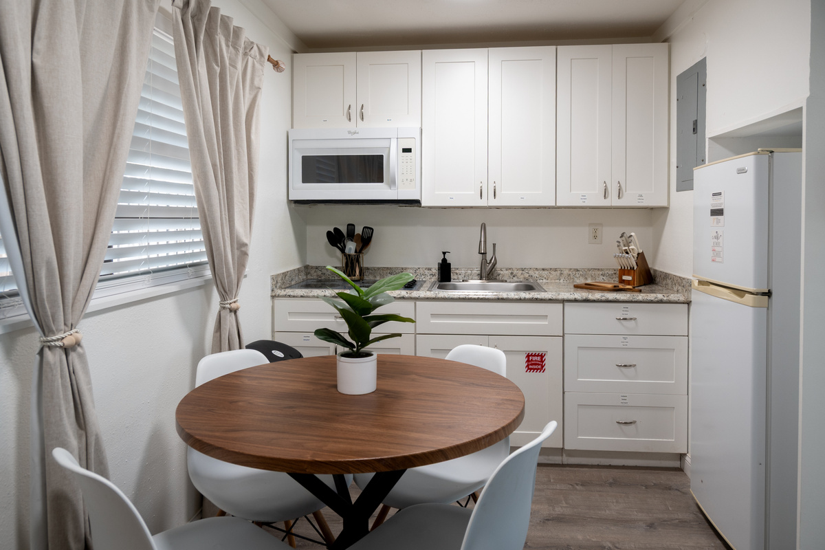 Full kitchen with dining table for four