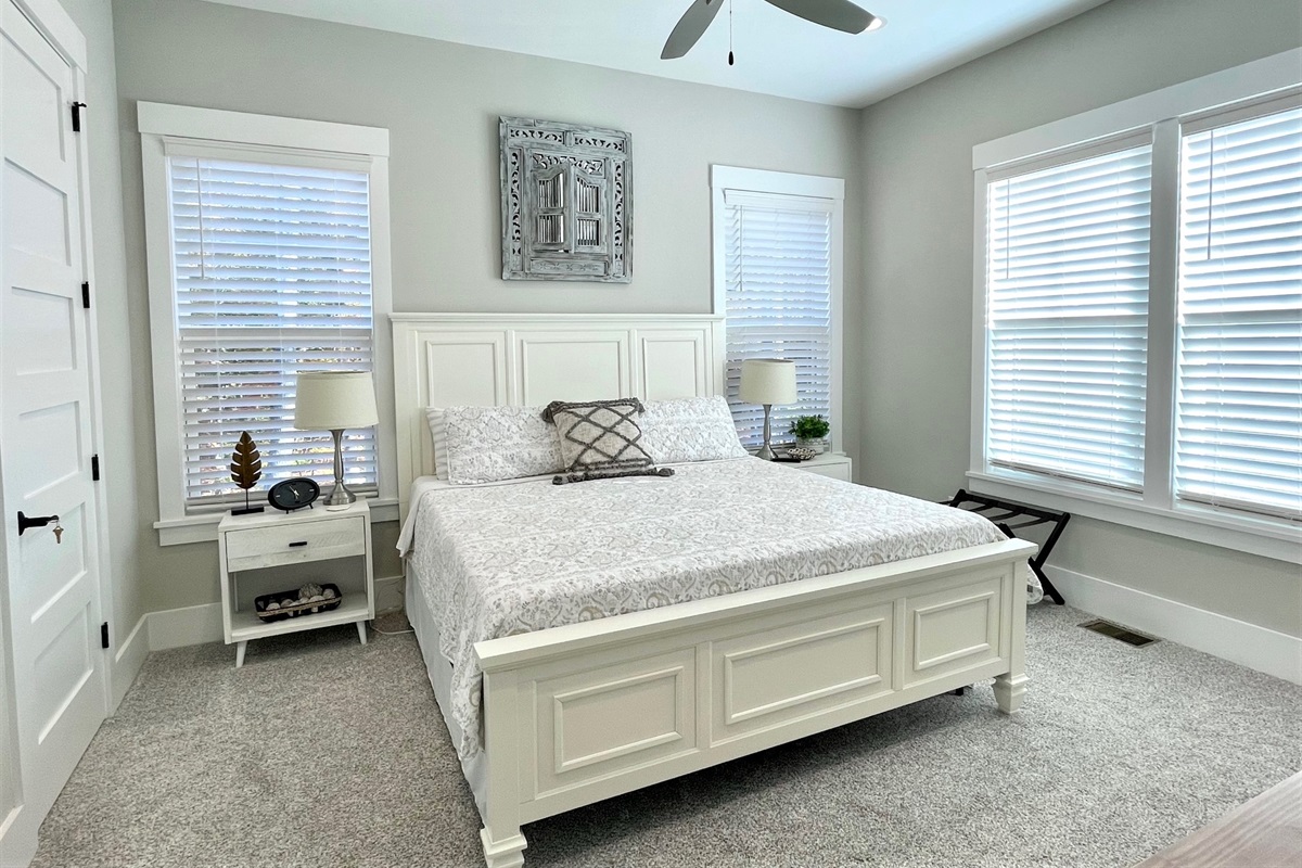 Main floor primary bedroom with king and private bath